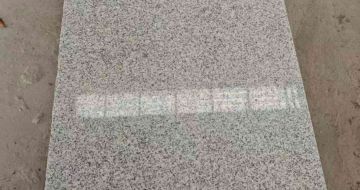 天津芝麻白光面毛板