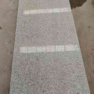 天津芝麻白光面毛板