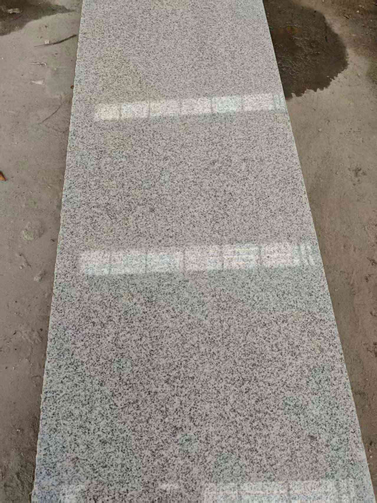 天津芝麻白光面毛板